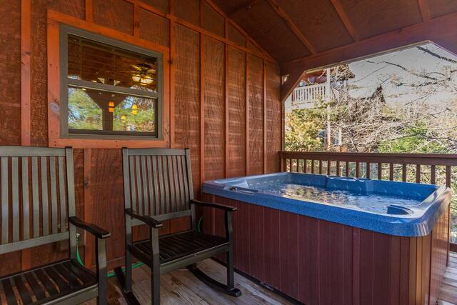 back porch of cabin with hot tub in Pigeon Forge 